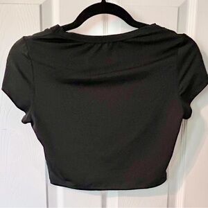 *Minimum $15 total. Black Fitted Crop Top with Short Sleeves